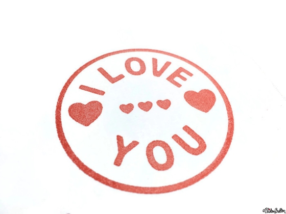 Close Up of I Love You and Hearts Stamped Image on a Simple Red and White I Love You, Hearts and Arrow Hand Stamped Square Card - Love is on the Cards! at www.elistonbutton.com - Eliston Button - That Crafty Kid